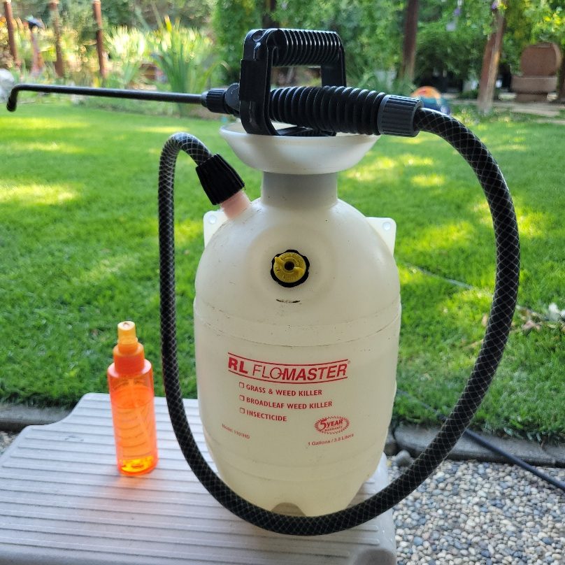 An RL Flo-Master gallon sprayer.